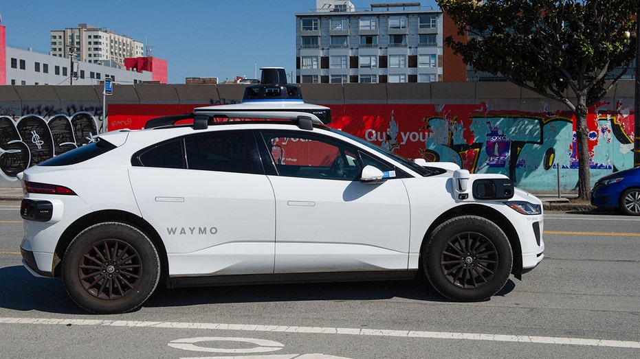Robotaxi drives off from airport with passenger's suitcase Architects Australia